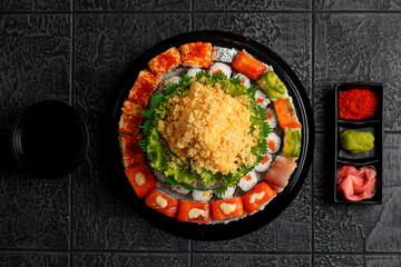Sushi cake consists of uramaki sushi and norimaki sushi. Perfect for recipe, article, catalogue, or any commercial purposes.