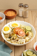 Soto ayam Lamongan. Lamongan chicken yellow soup. Perfect for recipe, article, catalogue, or any commercial purposes.