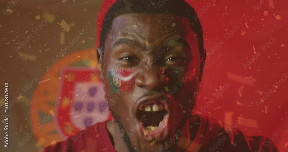 Canvas Prints Animation of confetti falling over african american footballer celebrating over flag of portugal