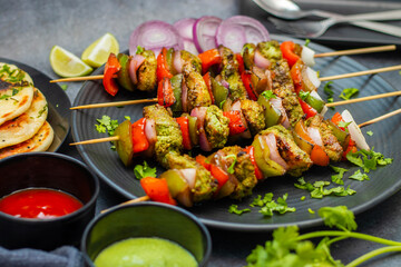 Selective focus of Succulent Hariyali Chicken Tikka Kabab, A Flavorful Blend of Herbs, Spices, and Grilled to Perfection