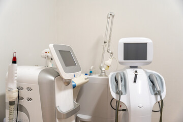 Modern Aesthetics: A sleek and sophisticated image featuring high-tech medical equipment used for skin rejuvenation and beauty treatments. The clean.