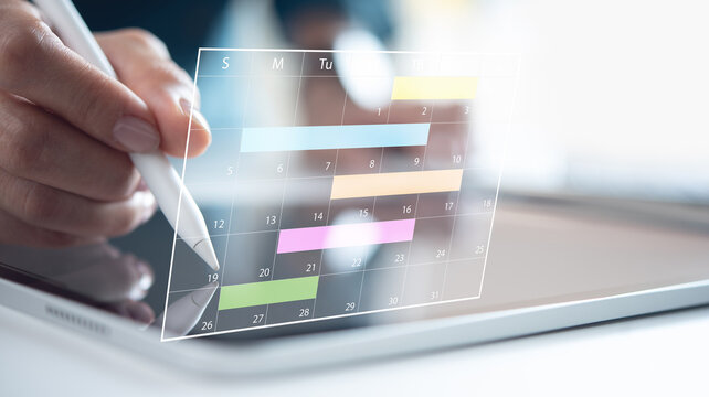 Business plan on calendar planner. Businessman manage business schedule for effective work. Calendar planner on virtual screen appointment reminders and meeting agenda, event planning