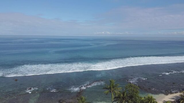 Aerial view in Mauritius over Pointe aux Piments beach, a beautiful tropical beach in the Indian Ocean