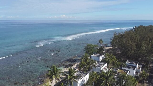 Aerial view in Mauritius over Pointe aux Piments beach, a beautiful tropical beach in the Indian Ocean