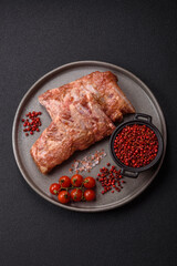 Pork ribs in sweet and sour sauce with salt and spices