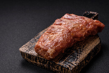 Pork ribs in sweet and sour sauce with salt and spices