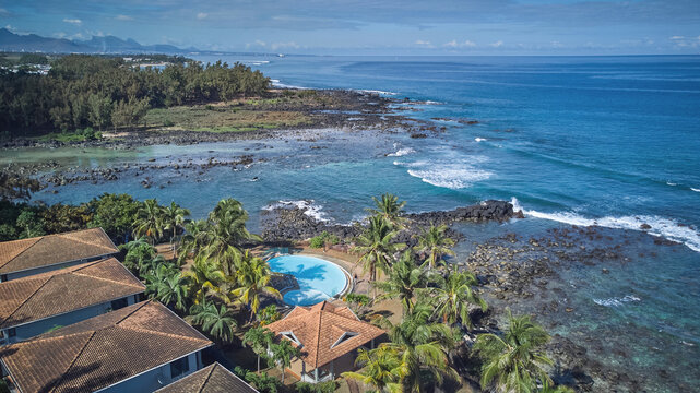 Aerial view in Mauritius over Pointe aux Piments beach, a beautiful tropical beach in the Indian Ocean