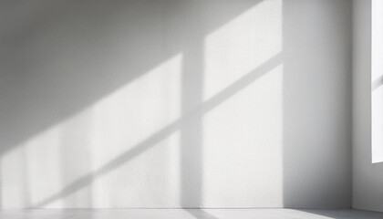 Minimalist white empty room with shadow light from window on concrete wall texture background