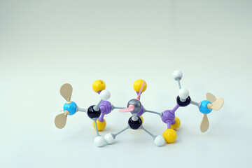 Simulate Shape of covalent molecules on gray background. Soft and selective focus.