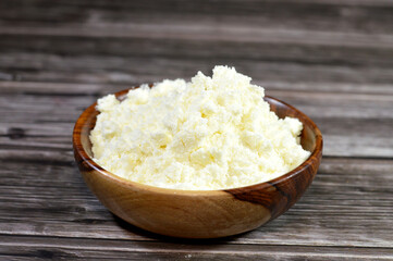 powdered dry milk, a manufactured dairy product made by evaporating milk to dryness to preserve it with longer shelf life, Powdered milk is used for food as an additive and as a drink nutrition