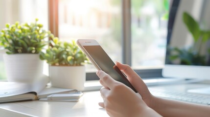 Woman Using Smartphone at Home Office