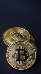 Golden bitcoin or BTC cryptocurrency, Focus selected, dark background