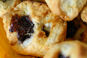 Detail of puff pastry with jam.
