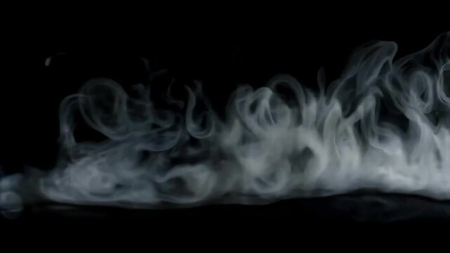 Smoke rising as it flows from the right side of the screen to the left side (can be played on a loop)