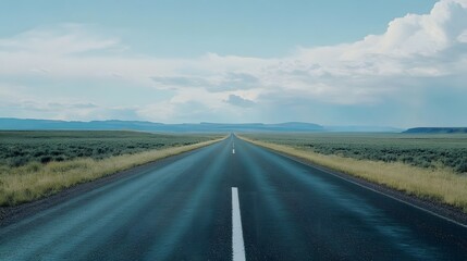 A straight road stretches into the distance, symbolizing progress and new beginnings in your journey of self-reflection