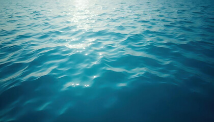 Obraz premium A rippled water surface reflecting light, creating mesmerizing patterns and glimmers, capturing the tranquility of nature and the beauty of sunlight dancing on the water.