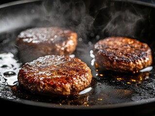 Sizzling Burger Patties Cooking in a Pan