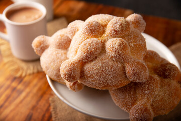 Pan de Muerto. Typical Mexican sweet bread that is consumed in the season of the day of the dead. It is a main element in the altars and offerings in the festivity of the day of the dead.