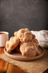 Pan de Muerto. Typical Mexican sweet bread that is consumed in the season of the day of the dead. It is a main element in the altars and offerings in the festivity of the day of the dead.