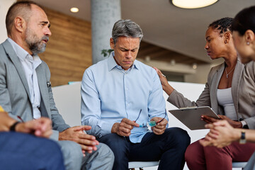 psychotherapy meeting man support therapy psychology patient sad cry hug crying businessman tear  friend depression group emotion pain psychologist communication help