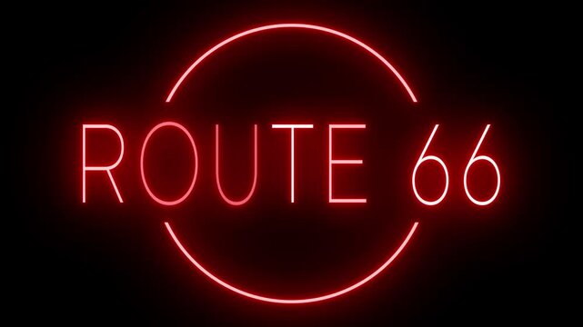 Flickering red retro style neon sign glowing against a black background ROUTE 66