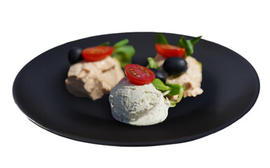 Showcase the smooth, flavorful fish pate on a plate with slices of cherry tomatoes and olives. This close-up image is ideal for gourmet menus, emphasizing its rich texture and presentation.