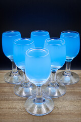 High-proof alcohol in a glass, bar, club.
