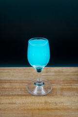 High-proof alcohol in a glass, bar, club.
