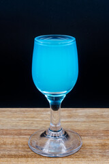 High-proof alcohol in a glass, bar, club.
