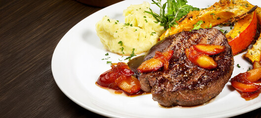 Grilled Deer Steak with smashed Potato, roasted Pumpkin and caramelized Apricots