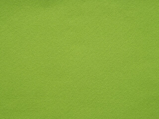 Vibrant green felt canvas, bursting with the energy of lush meadows in the heart of summer