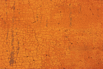 Orange grunge cracked wall texture, weathered terracotta plaster background with peeling paint details.