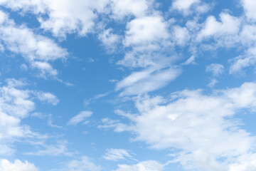 Low angle view of beautiful blue sky with strange shape of clouds in the morning or evening used as natural background texture in decorative art work