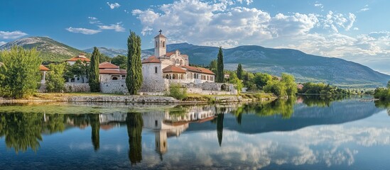 Obraz premium Serene Church by the Lake