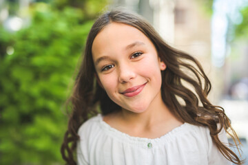Fototapeta premium Happy teen girl 11-15 year old. Portrait beautiful woman