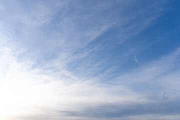 Fototapeta premium Beautiful morning or evening blue and orange sky while sunsets or sunrises taken at the sea used as natural blackground texture.