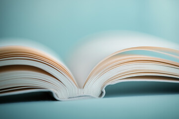 Naklejka premium Close-Up of Open Book Pages Side View