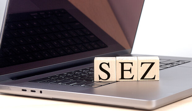 SEZ concept with wooden blocks on laptop keyboard