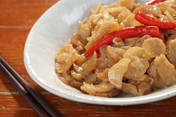Stir Preserved Radish with coconut milk, vegetarian food, Chinese food. Selective focus and free space for text.
