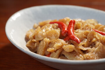 Stir Preserved Radish with coconut milk, vegetarian food, Chinese food. Selective focus and free space for text.