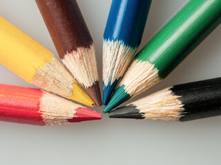 A macro shot of colored pencils showing the vibrant hues and details that inspire creativity and the art of drawing