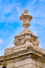 Stone decorative vase in the exterior of the medieval Royal Palace, Madrid, Spain.