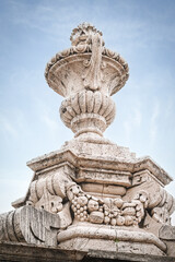 Stone decorative vase in the exterior of the medieval Royal Palace, Madrid, Spain.