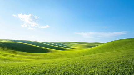 Obraz premium Serene Green Rolling Hills Under a Bright Blue Sky in a Peaceful Landscape, Green Meadow