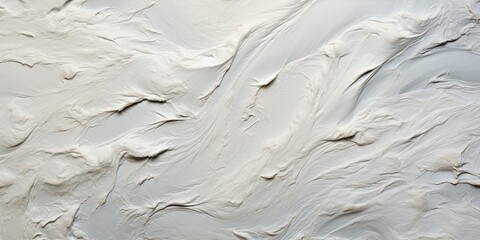 Obraz premium Abstract Swirling White Substance with Uneven Texture and Subtle Variations in Tone