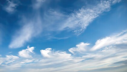 Stratus clouds are low level clouds characterized by horizontal layering with a uniform base, as opposed to convective or cumulonimbus clouds formed by rising thermals, blue sky background