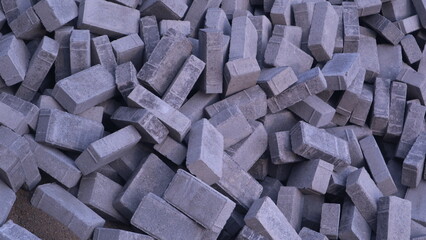  Pile of paving block, grey abstract textured background, copy space