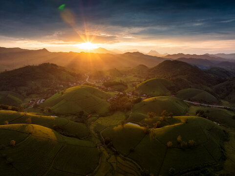 Aerial view of beatiful sunset at Long Coc tea hill, Phu Tho province, Vietnam