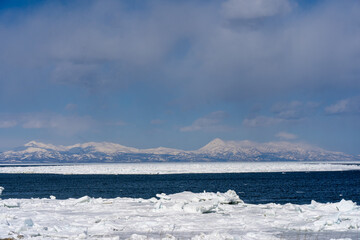 Drift ice and Shiretoko mountain in hokkaido Japan © 善弘 石垣