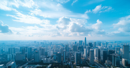 Aerial View of City Skyline and Skyscrapers Under Blue Sky and White Clouds